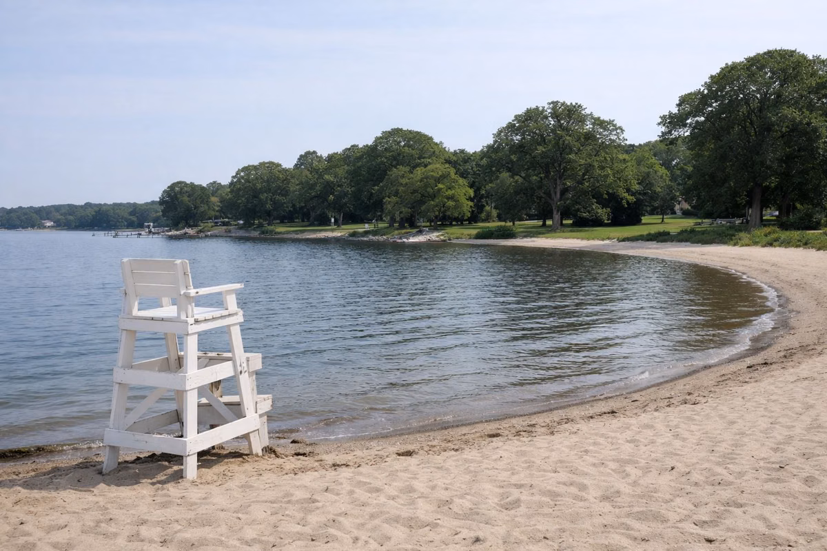 Calm bay beach with a lifeguard chair
