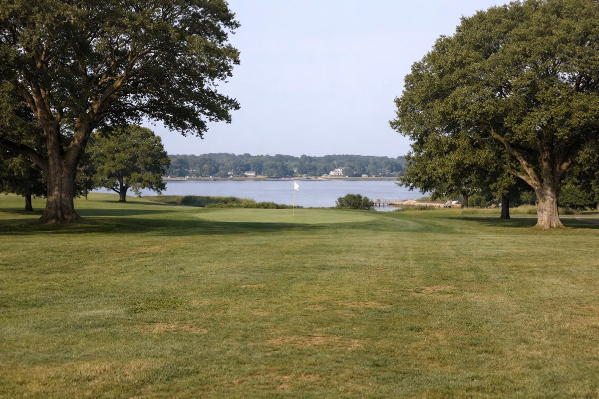 Fairway and green beside the bay